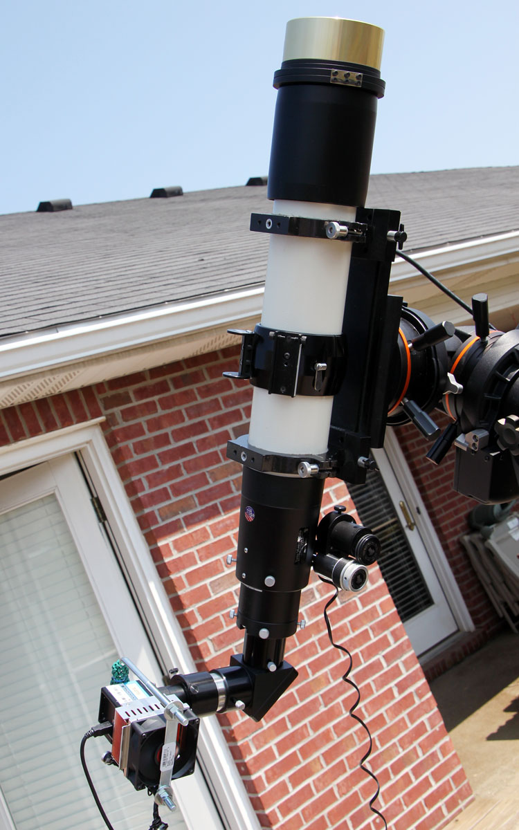 A wider view of the camera and cooling assembly attached to my Televue 102iis refractor with Coronado SM90 h-alpha filter.