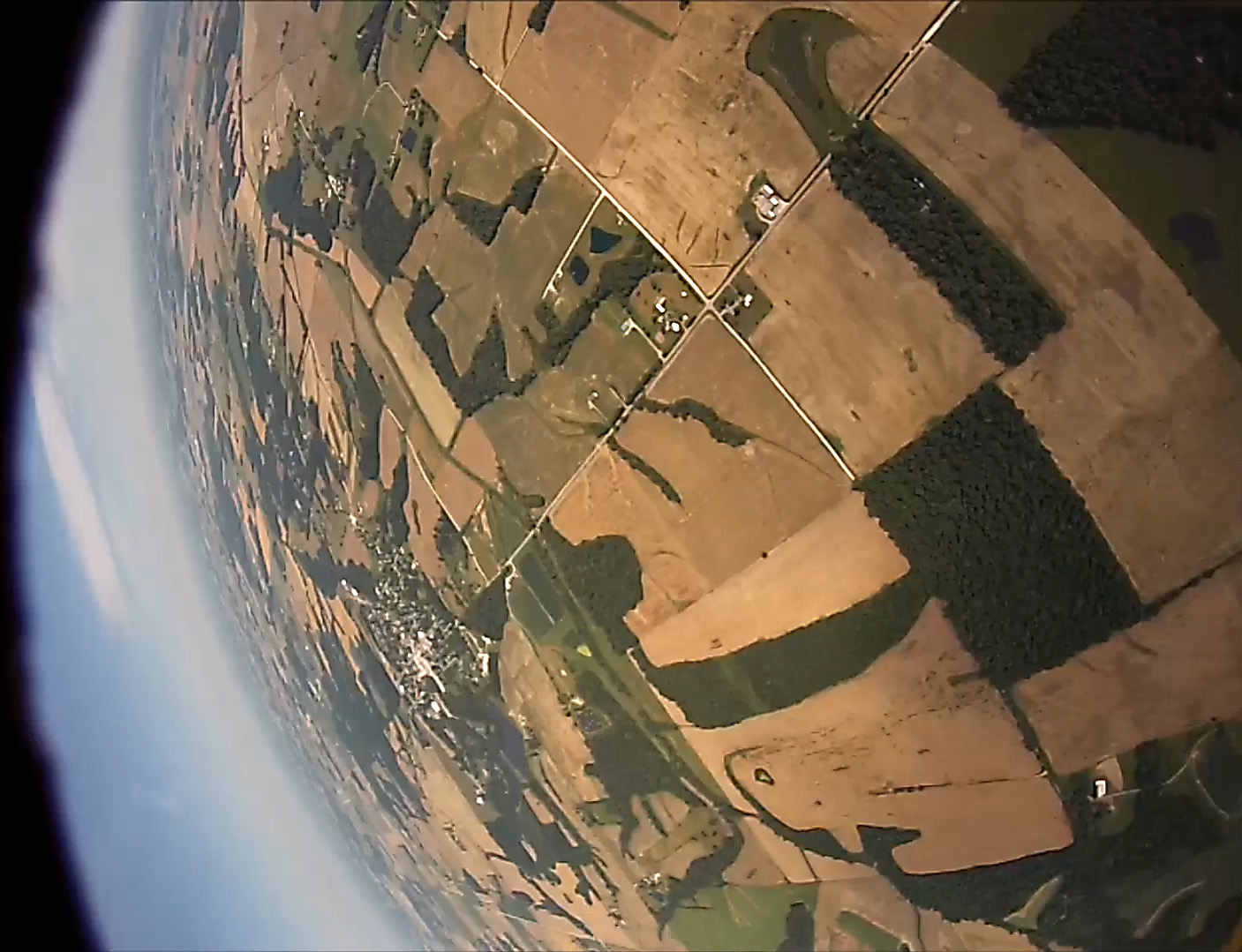 View from the onboard GoPro Hero 3 Camera looking out the side of the rocket. 