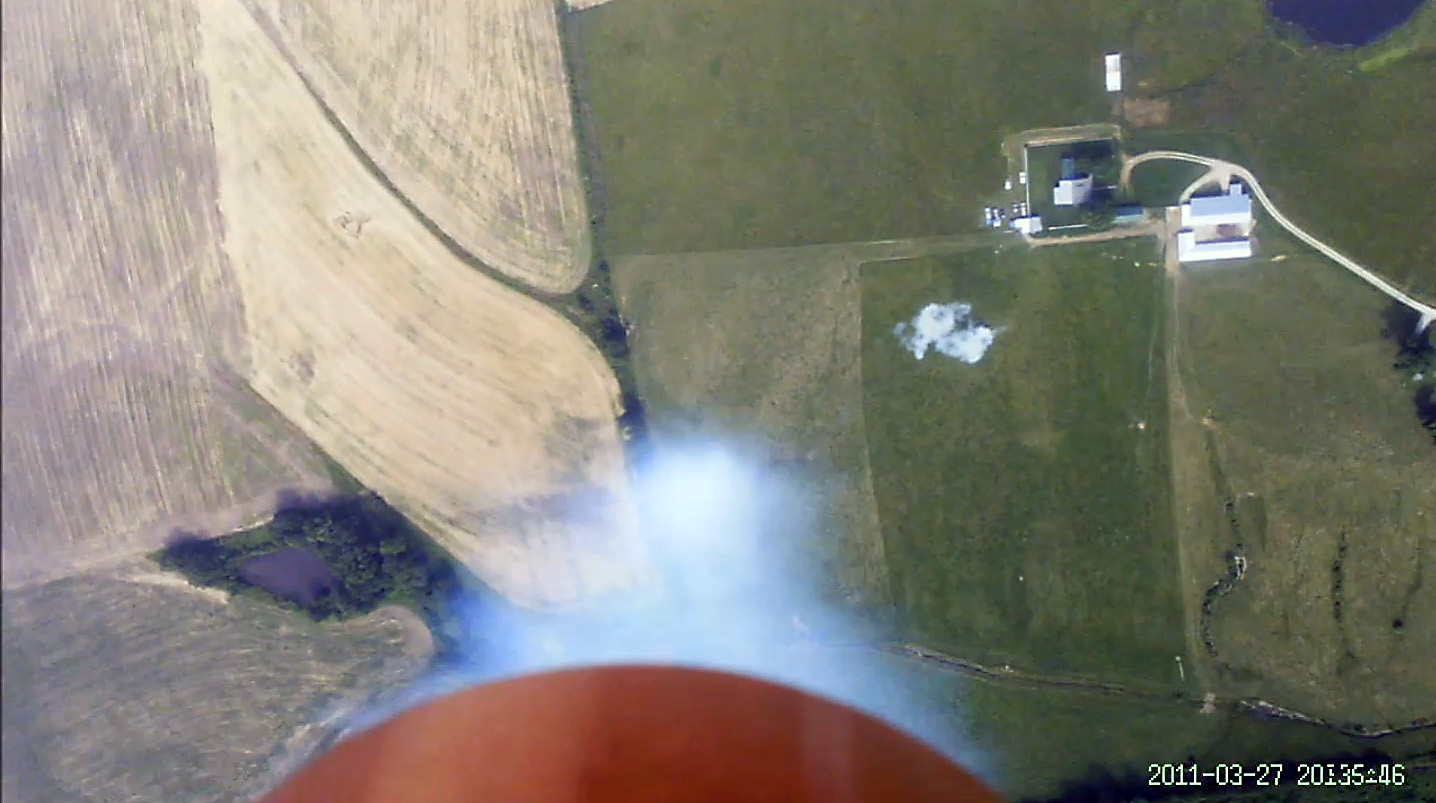 View from the onboard Booster Vision Camera looking down toward the tail of the rocket. 