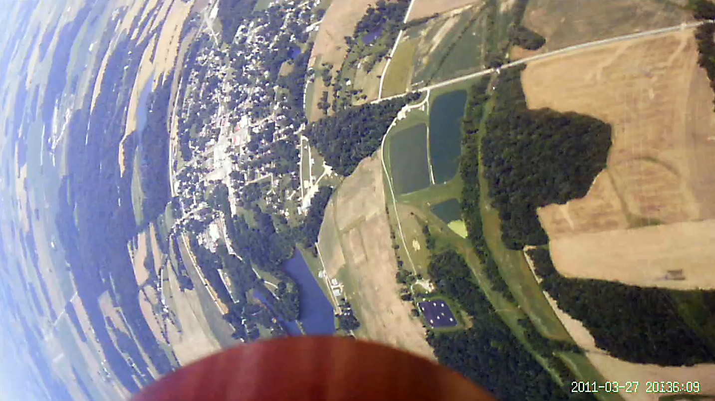 View from the onboard Booster Vision Camera looking down toward the tail of the rocket. 