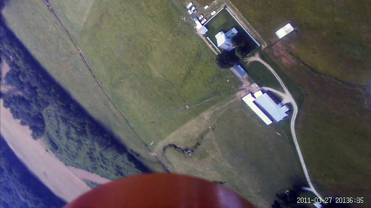View from the onboard Booster Vision Camera looking down toward the tail of the rocket. 