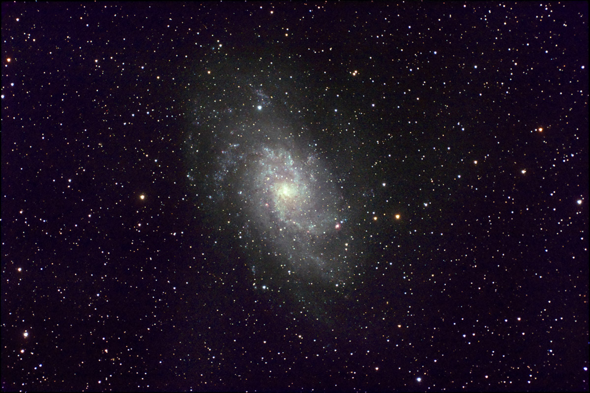 Spiral Galaxy M33 in Triangulum, taken 11/26/08 with an Orion Starshoot Pro CCD, through a Televue 102iis refractor with .8X reducer. Autoguided with an Orion Starshoot Autoguider through a Televue 85 refractor. Both scopes mounted a Losmandy G11 Mount. 