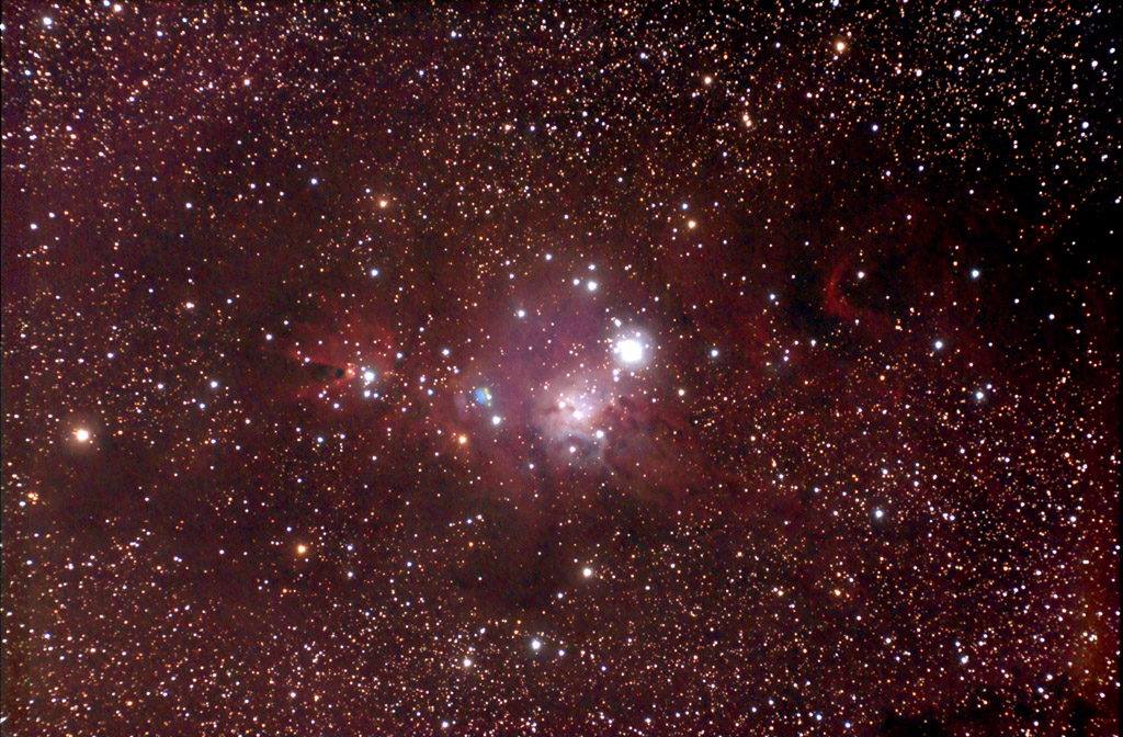 Christmas Tree Cluster (NGC-2264) and Cone Nebula in Monocerous taken December 29, 2008 with a Orion Starshoot Pro CCD camera through a Televue 102iis refractor and autoguided with a Starshoot Autoguider through a TV-85 refractor piggybacked on the TV-102iis, and mounted on a Losmandy G11 mount.