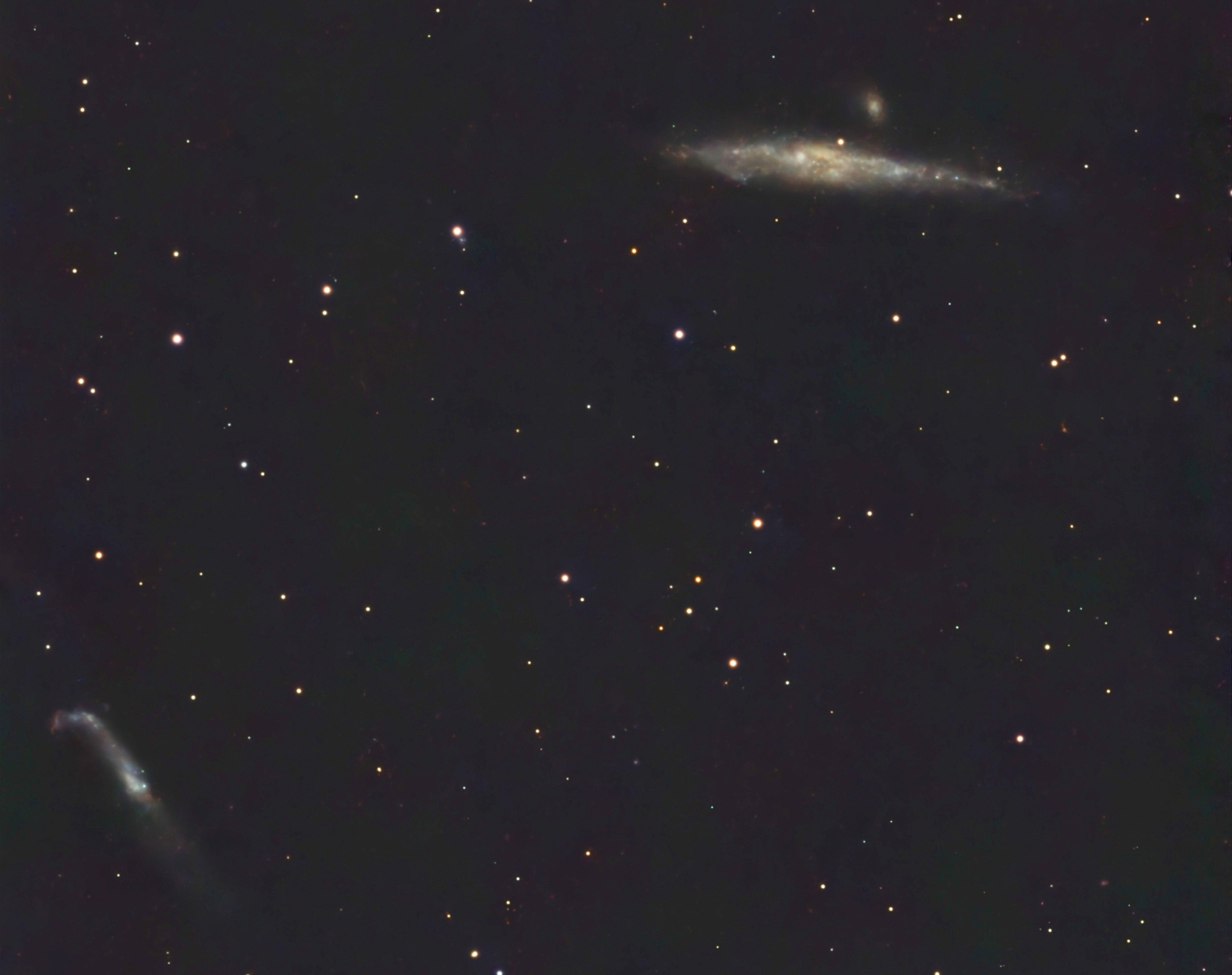 Galaxies NGC4627 and NGC4657, also known as the Whale and Hockey Stick taken 03/21/26 with a Seestar S50 Smart Telescope