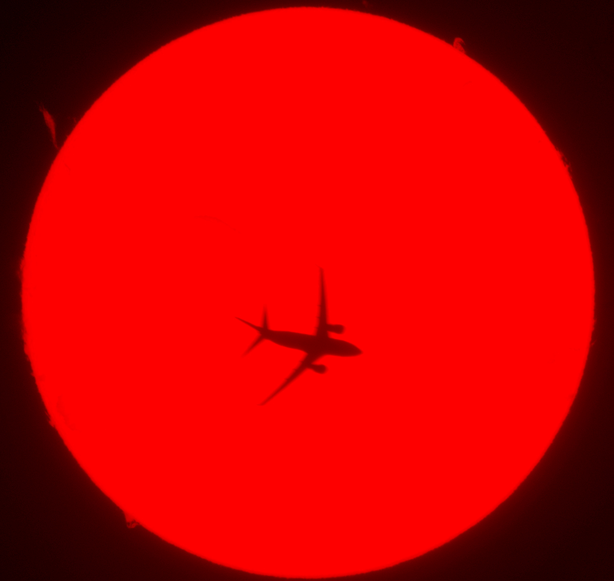 Airplane transit in h-alpha 08/07/26